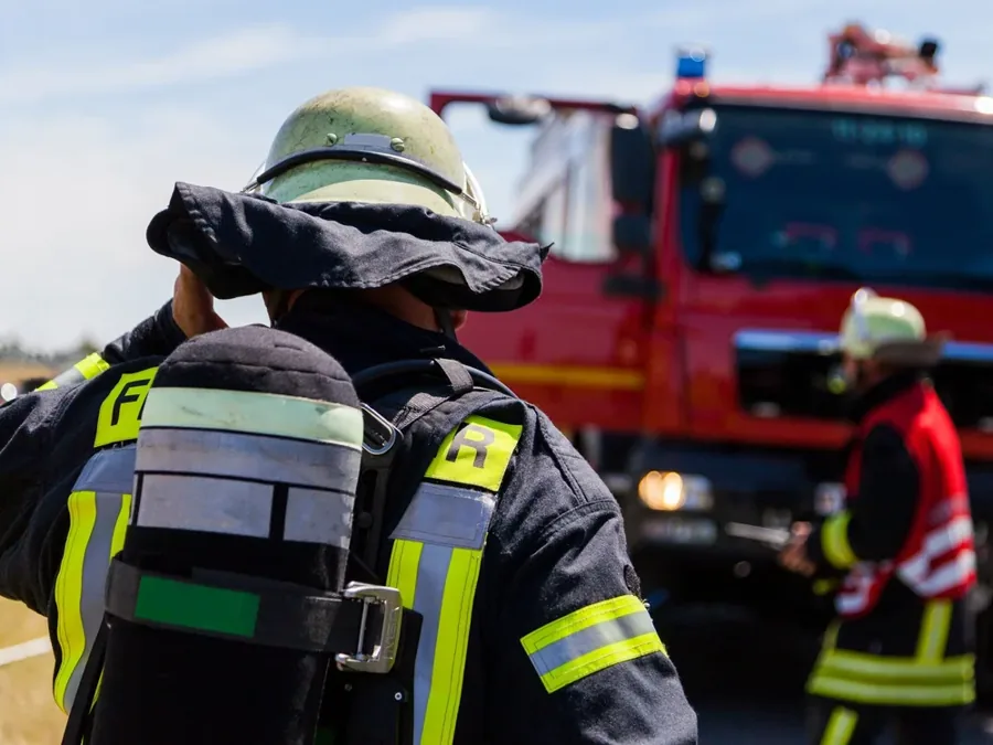 First responders near a fire truck